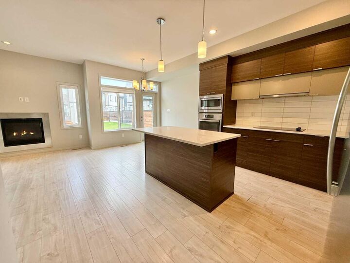 Property Photo:  482 Highlands Boulevard W 2  AB T1J 5K5 