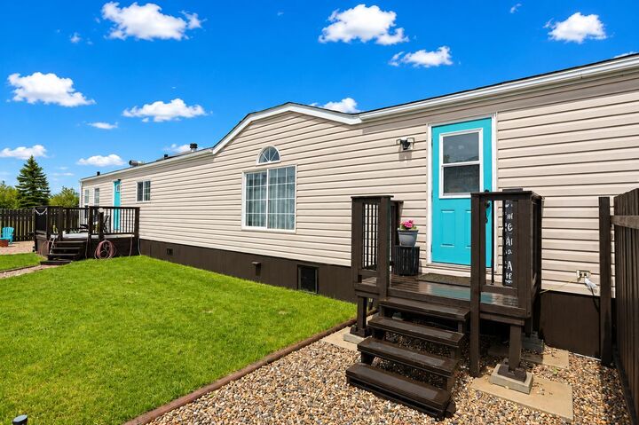 Property Photo:  23 Meadowlake Gate E  AB T1R 1E9 