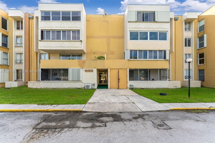 Property Photo:  6911 SW 147th Ave 2H  FL 33193 