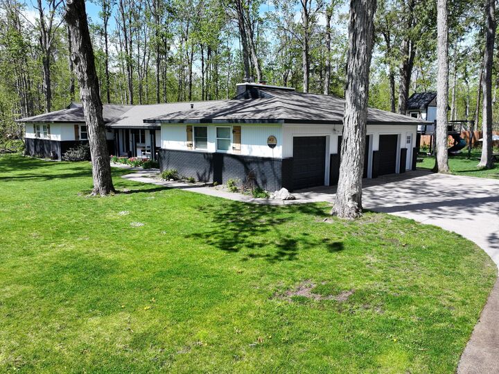 Property Photo:  2402 Manorwood Drive  MI 49735 