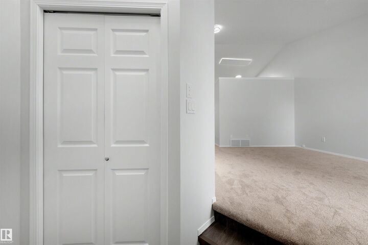 Property Photo:  11815 8 Avenue NW  AB T6J 6Z9 