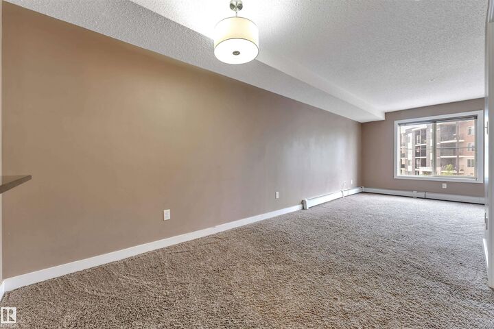 Property Photo: 11812 22 Avenue SW 209 AB T6W 2A2