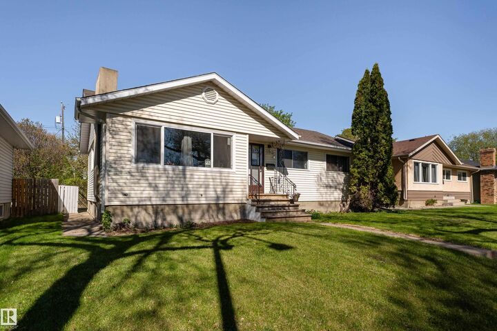 Property Photo:  11910 43 Street NW  AB T5W 2P6 