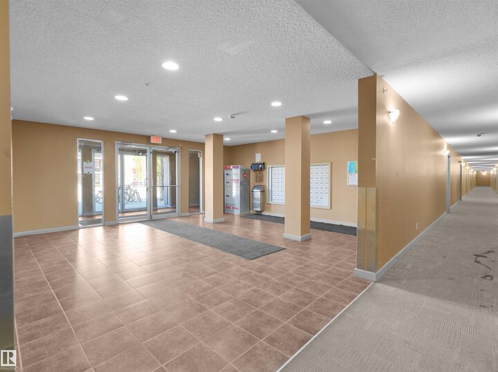 Property Photo:  12035 22 Avenue SW 115  AB T6W 2X9 