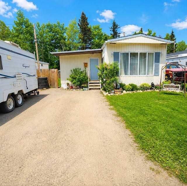 Property Photo: 726 Carmichael Lane 28 AB T7V 1T1