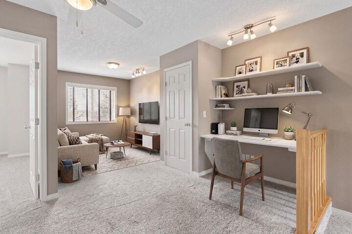 Property Photo:  25 Hidden Creek Rise NW  AB T3A 6L3 