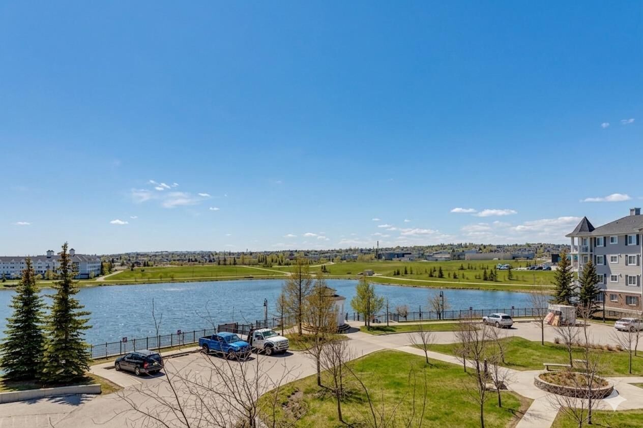 Property Photo:  5 Country Village Park NE 1309  AB T3K 0G1 