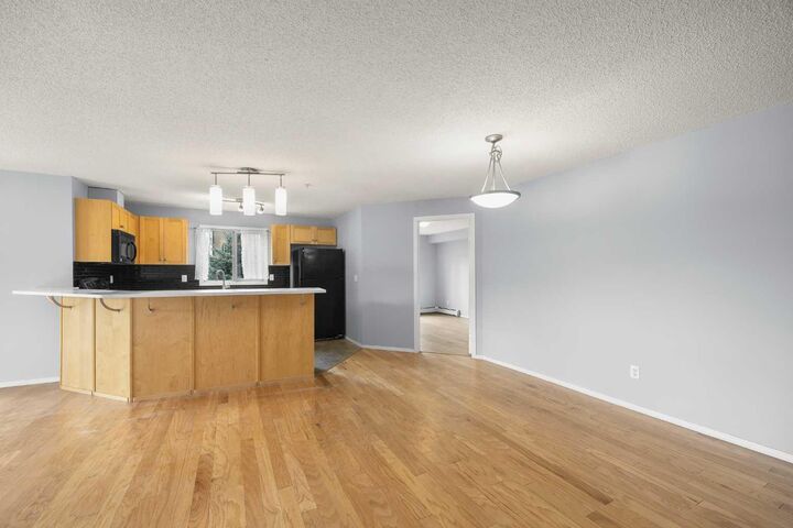 Property Photo:  60 Panatella Street NW 4201  AB T3K 0M4 