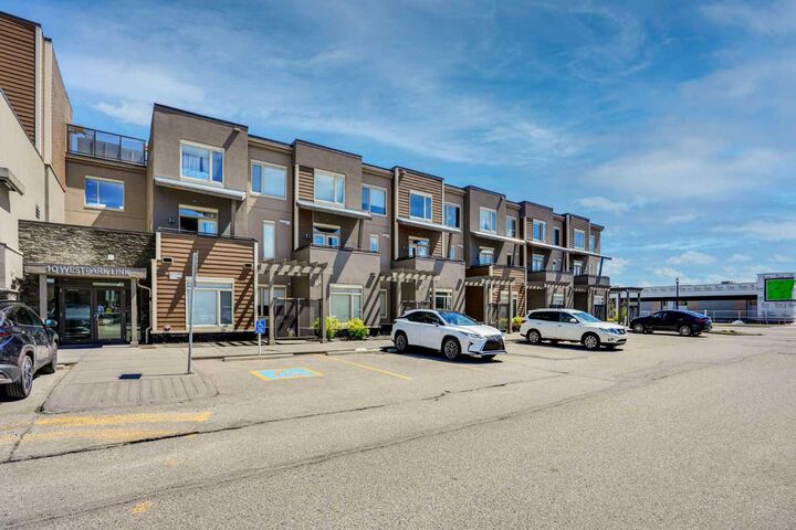 Property Photo:  10 Westpark Link SW 201  AB T3H 0Y5 