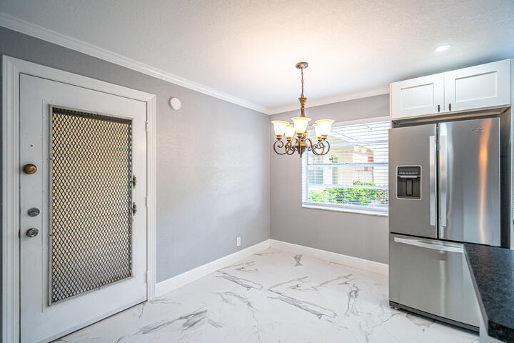 Property Photo: 244 Normandy F Lane FL 33484