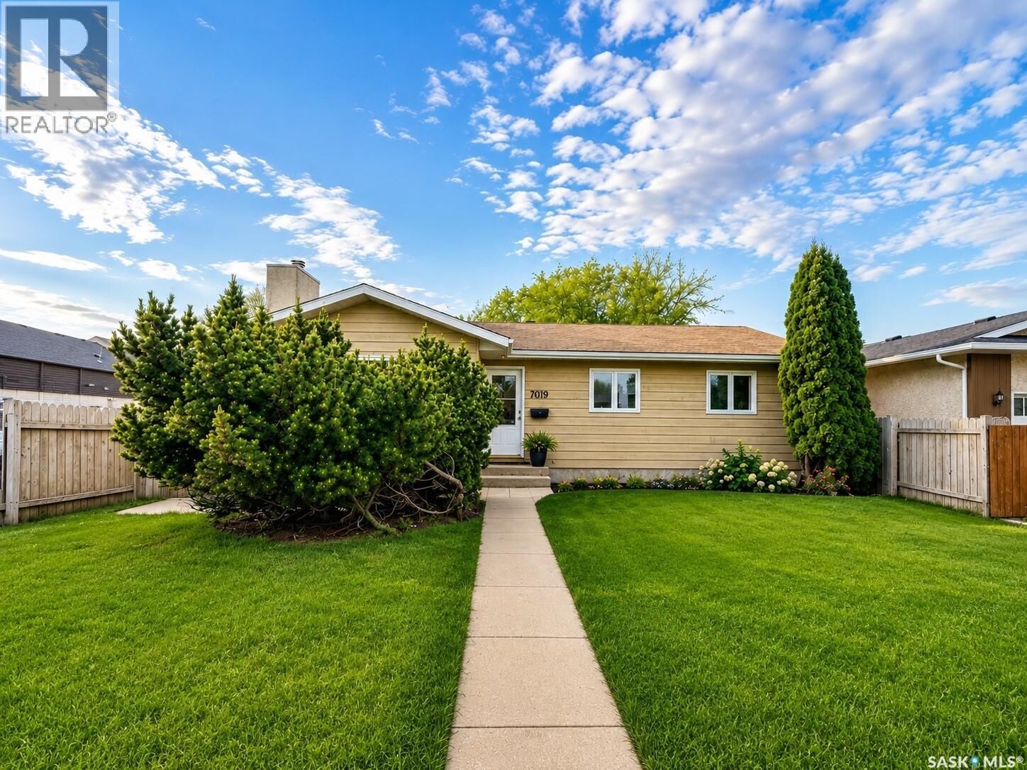 Property Photo:  7019 Sherwood Drive  SK S4X 2V5 