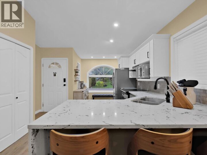 Property Photo:  2210 Louie Drive 26  BC V4T 2L3 