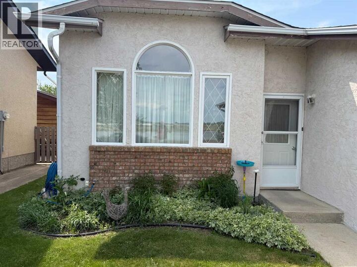 Property Photo:  719 Parkland Drive  AB T1R 0M3 