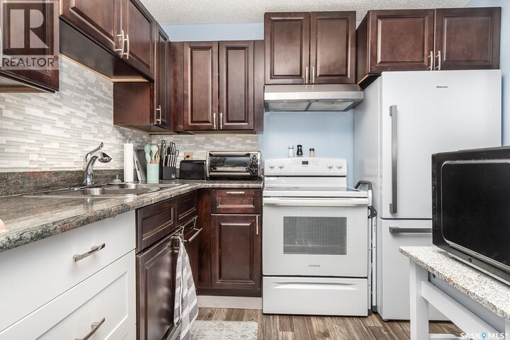 Property Photo:  101 314 Tait Crescent  SK S7H 5L2 
