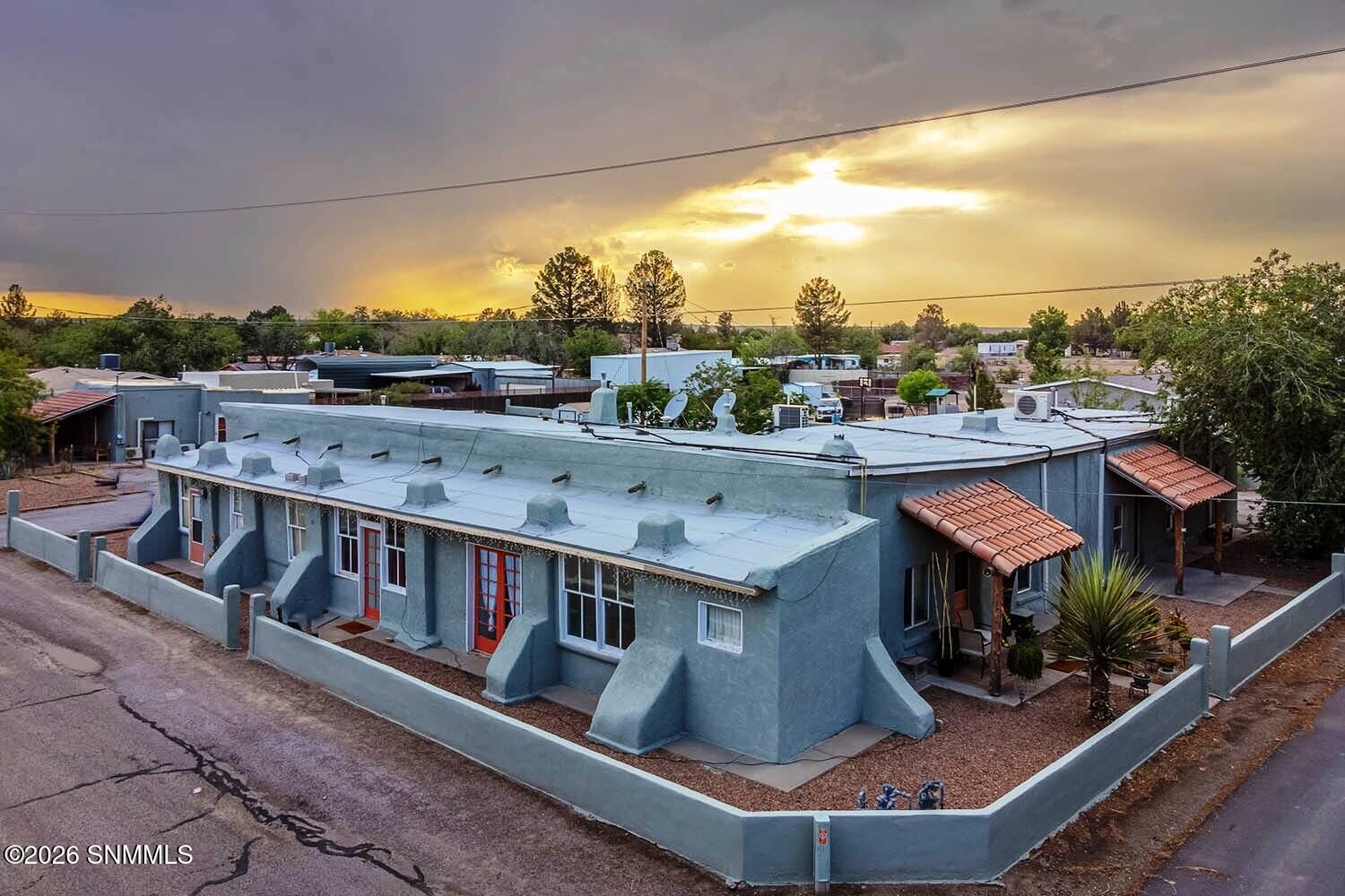 Property Photo:  393 E San Miguel Street 1-4  NM 88044 