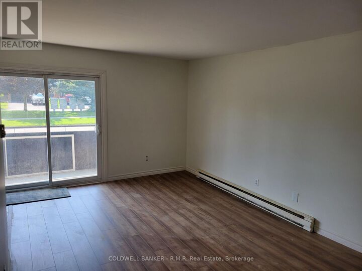 Property Photo:  251 Liberty Street North 3  ON L1C 2M6 