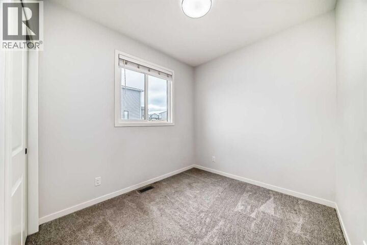 Property Photo: 212 Lucas Place Northwest AB T3P 2E6