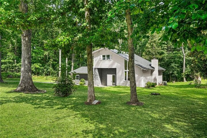 Property Photo:  6985 Butner Road  GA 30349 