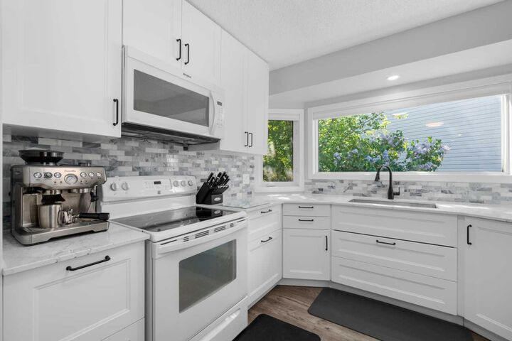 Property Photo: 24 Cedardale Rise SW AB T2W 3Y5