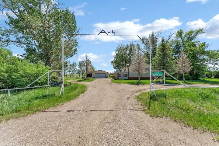 Property Photo: 6317 Township Road 114 2 AB T1A 7H1
