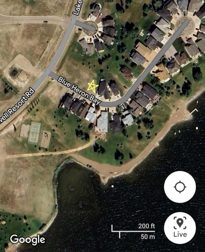 Property Photo: 27 Blue Heron Bay AB T1R 0X5
