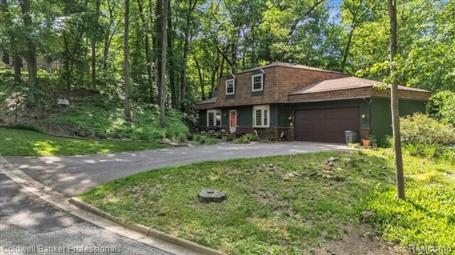 Property Photo: 8873 Nepahwin Drive MI 48348