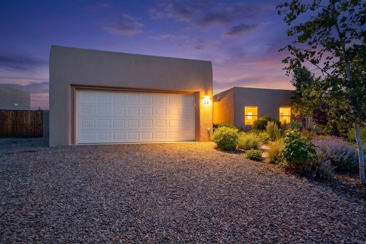 Property Photo: 28 Canto Del Pajaro NM 87508