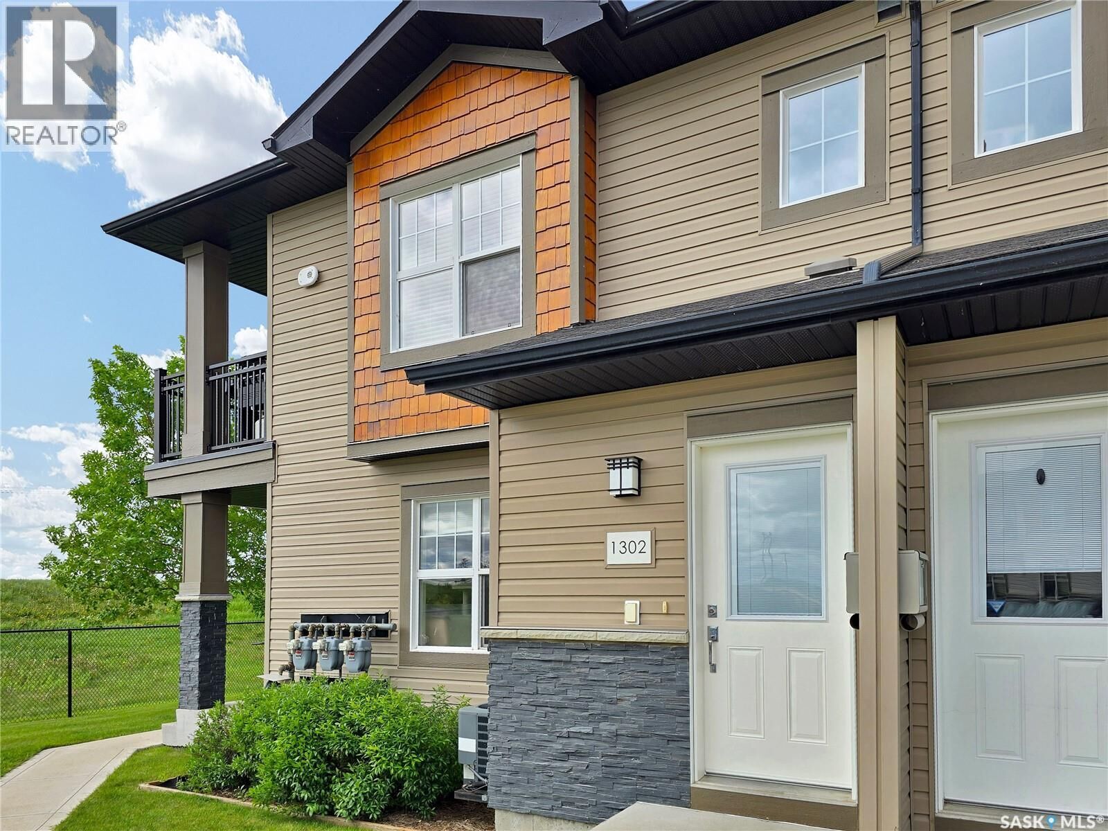 Property Photo:  1302 1015 Patrick Crescent  SK S7W 0M5 