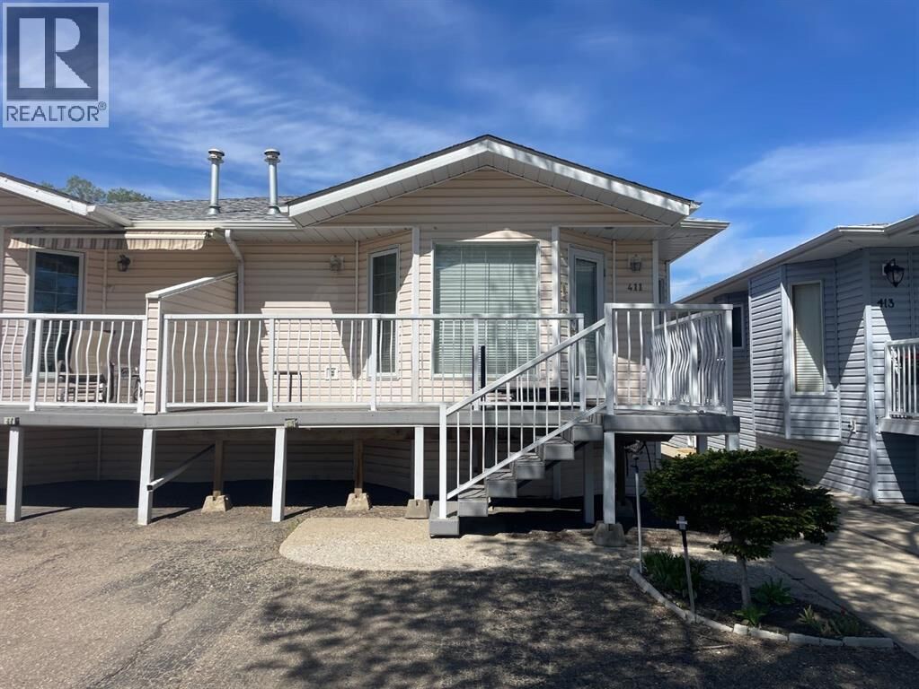 Property Photo:  411 3 Street  AB T1R 0E7 