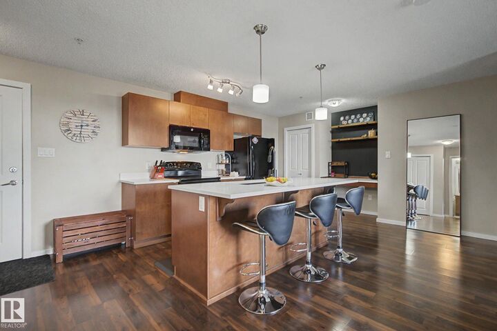 Property Photo: 504 Albany Way NW 334 AB T6V 0L2