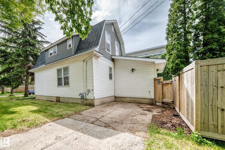 Property Photo:  10748 123 Street NW  AB T5M 0C4 