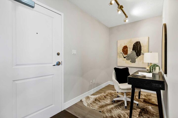 Property Photo: 55 Spruce Place SW 304 AB T3C 3X5