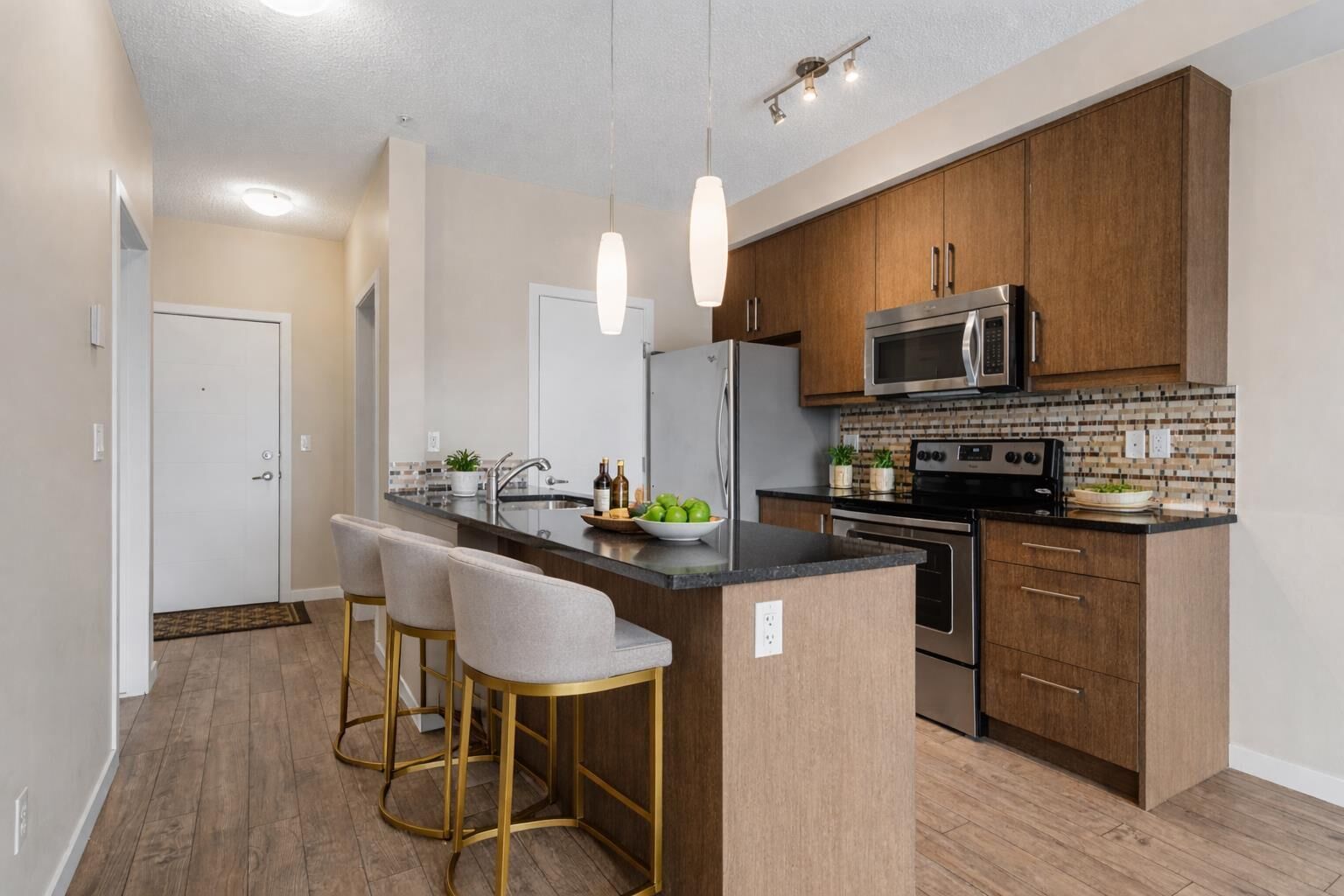Property Photo: 402 Marquis Lane SE 311 AB T3M 2G7