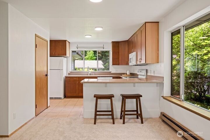 Property Photo:  9912 NE 142 Place B201  WA 98034 