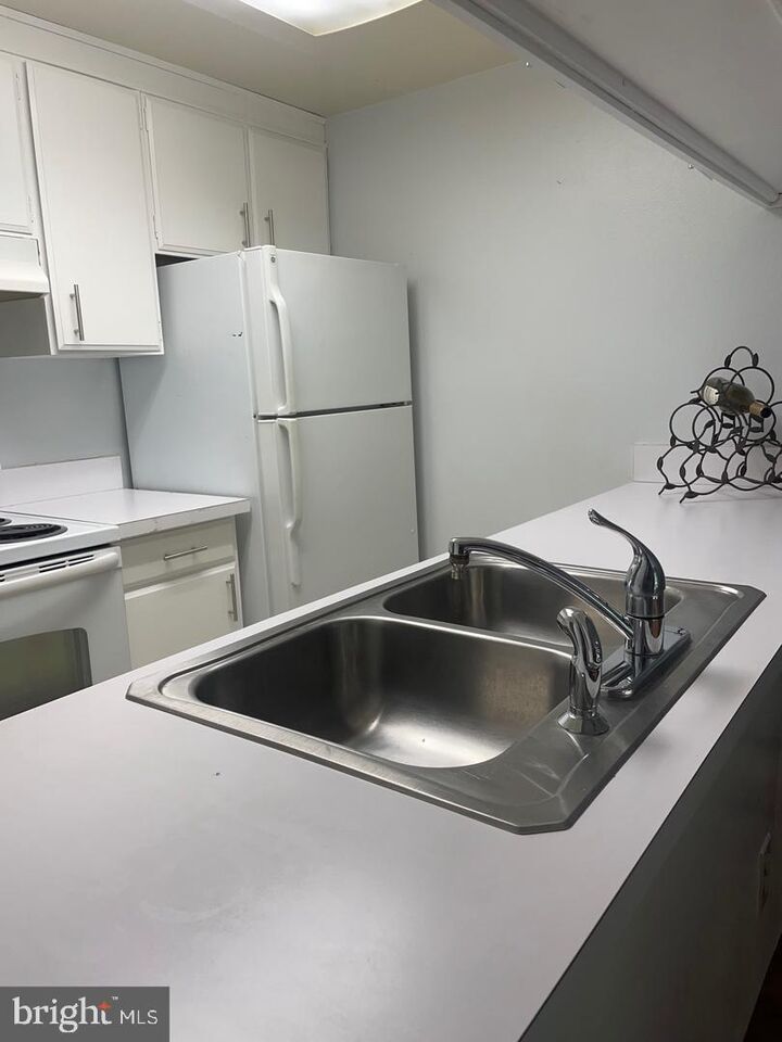 Property Photo: 3322 Chiswick Court #61-1F MD 20906