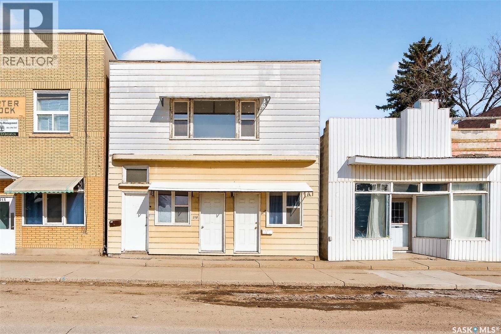Property Photo:  308-312 Fairford Street W  SK S6H 1V9 