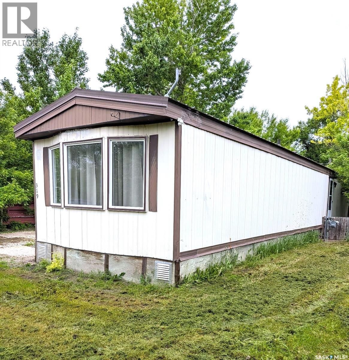 Property Photo: 319 4th Avenue SK S0A 1V0