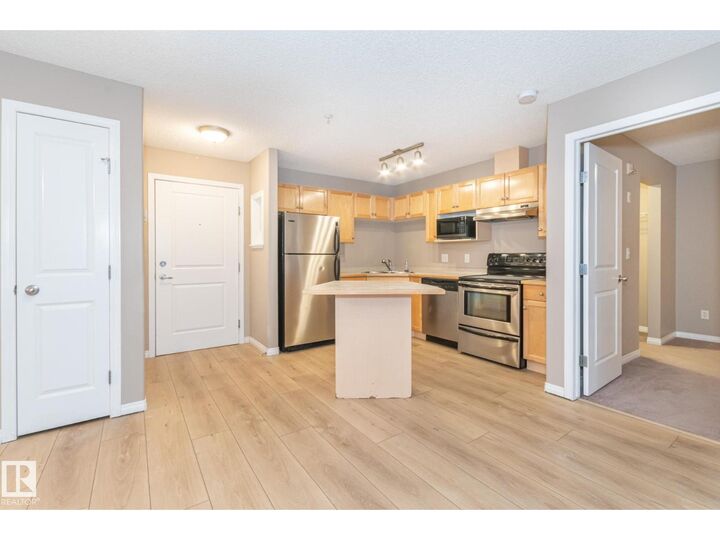 Property Photo:  #119 245 Edwards Dr SW  AB T6X 1J9 