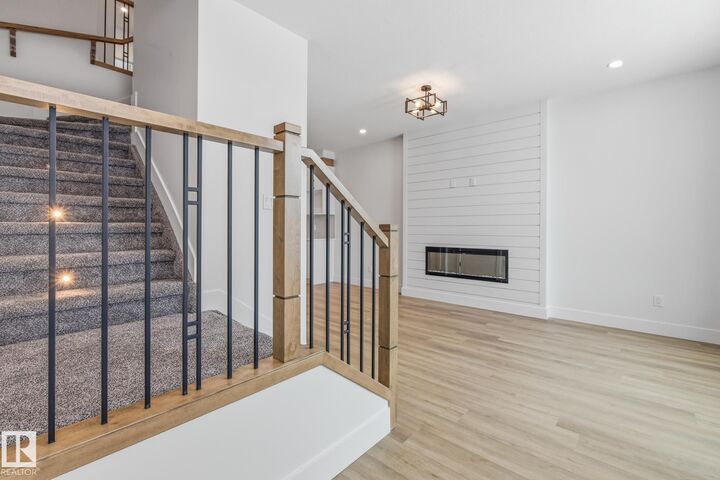 Property Photo: 102 Elliott Wynd AB T8L 1R8