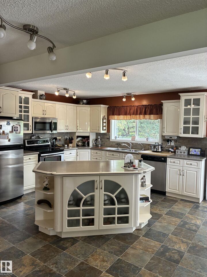 Property Photo: 25055 Twp Rd 492 AB T4X 2M6