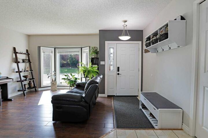 Property Photo: 65 Parkland Way E AB T1R 0M6