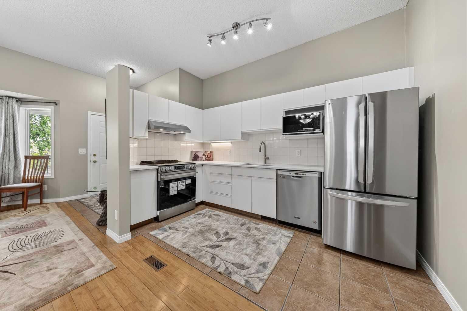 Property Photo: 73 Hidden Valley Villas NW AB T3A 5W7