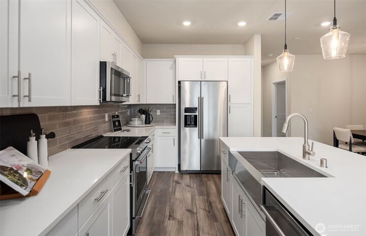 Property Photo:  14330  1st Avenue NE 205  WA 98019 