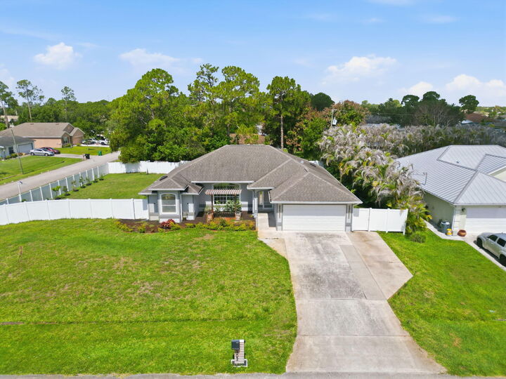 Property Photo: 102 NW Peach Street FL 34983