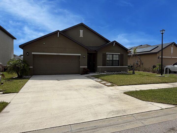 Property Photo:  5306 Entertainment Way  FL 34947 
