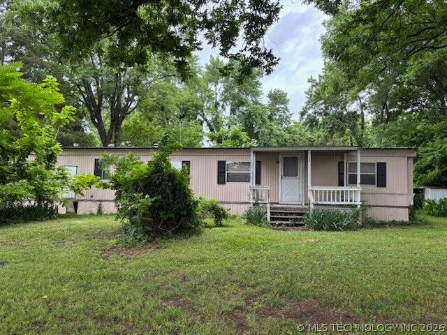 Property Photo: 110 W McDaniel Street OK 74470