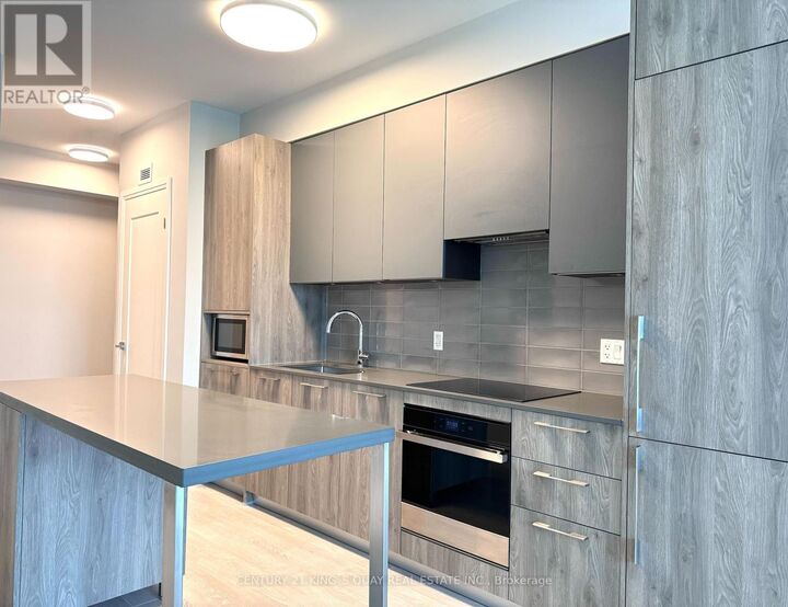 Property Photo: 38 Waterwalk Drive 331 ON L3R 6M8