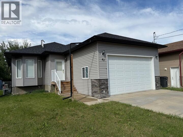 Property Photo: 42 Red Deer Avenue AB T0J 2E0