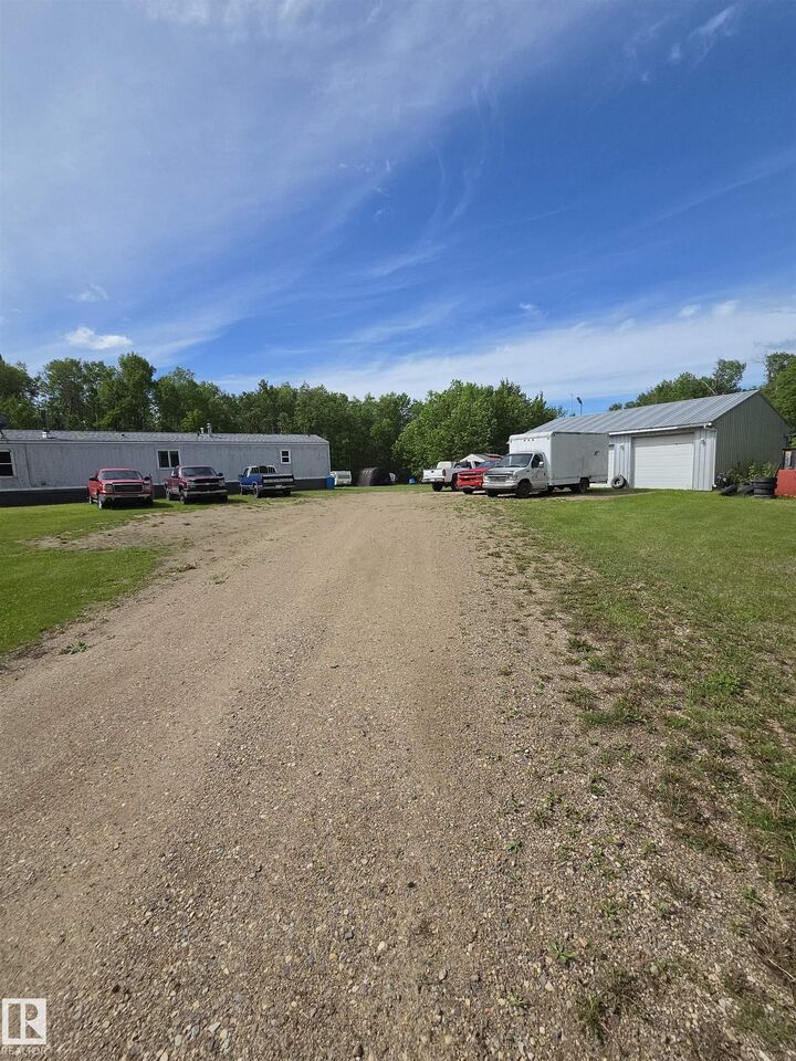Property Photo: 64126 Hwy 897 AB T9M 1P4