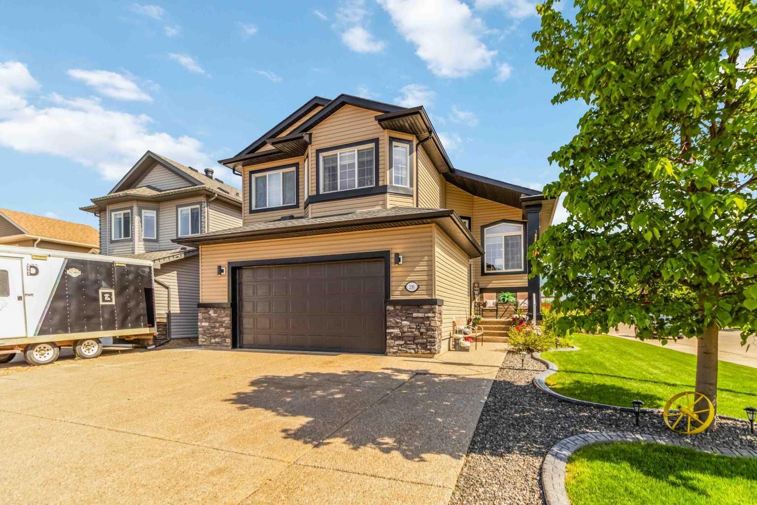 Property Photo:  209 Fireweed Crescent  AB T9K 0J4 